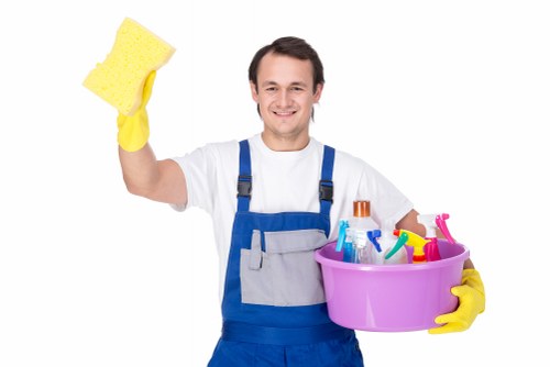 Professional Chelsea cleaners handling delicate garment care