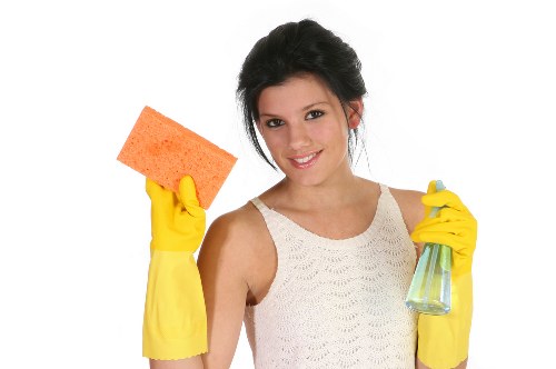 Chelsea cleaner performing detailed upkeep in a modern property
